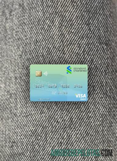 Cartão de débito Visa Standard Chartered do Zimbábue Photolook Front modelo